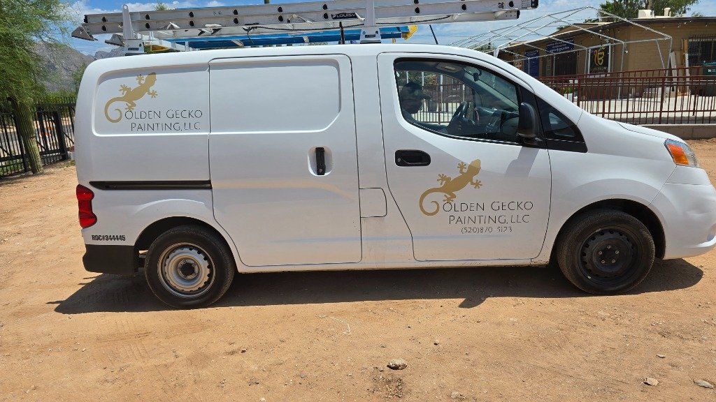 Golden Gecko Painting commercial work van parked outside facility